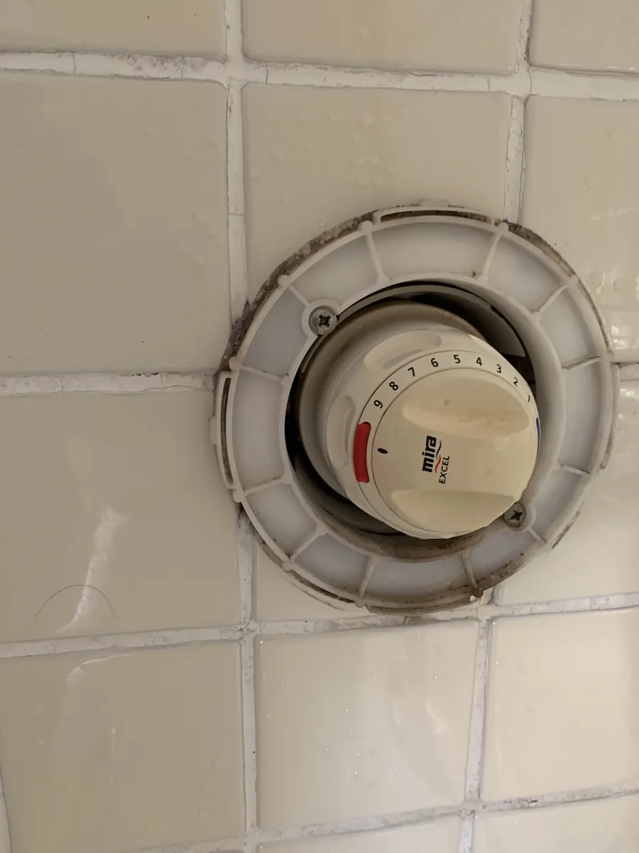 Old Mira shower valve before replacement in Exeter