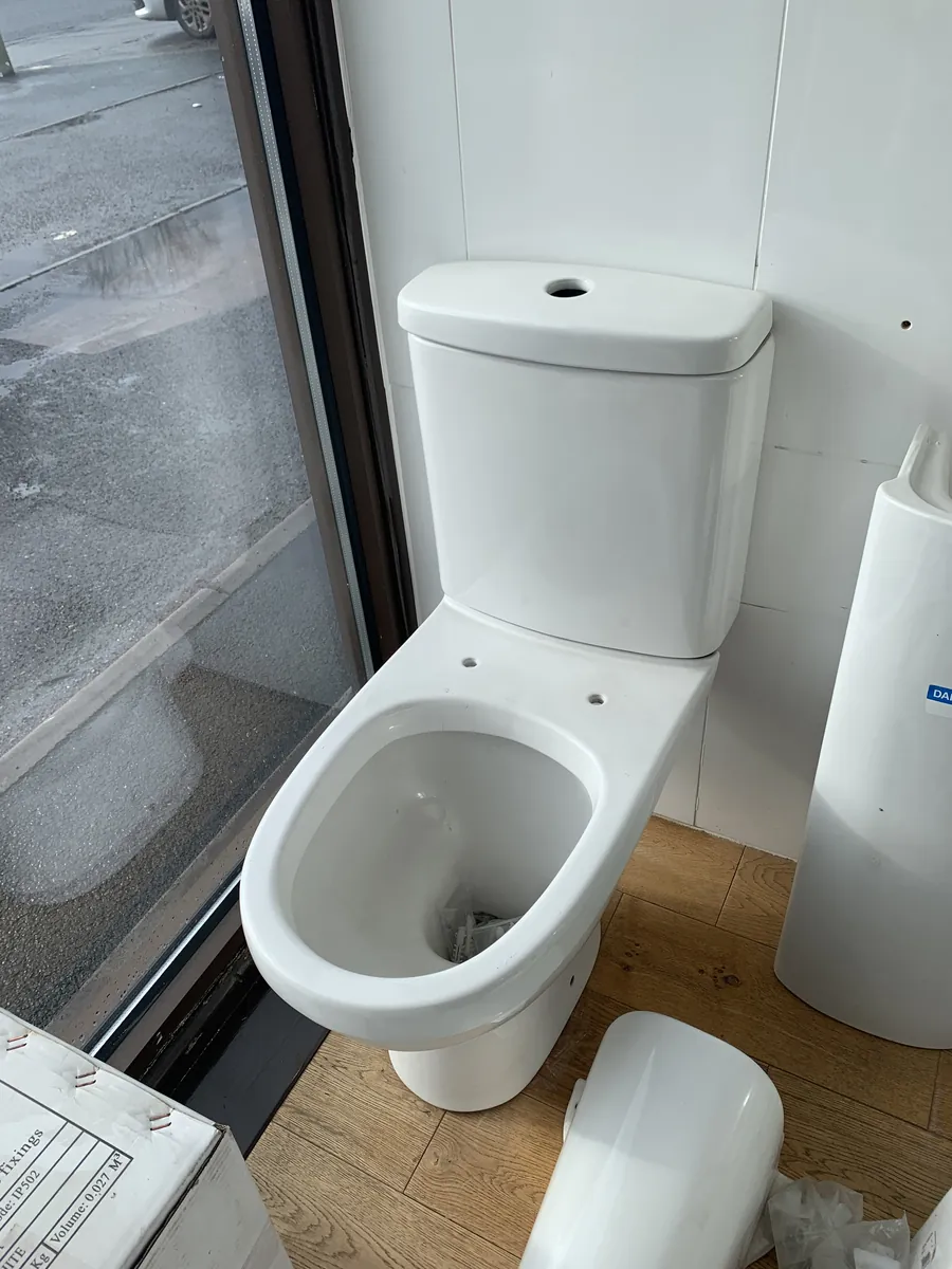 New close-coupled toilet fitted in an Exeter bathroom